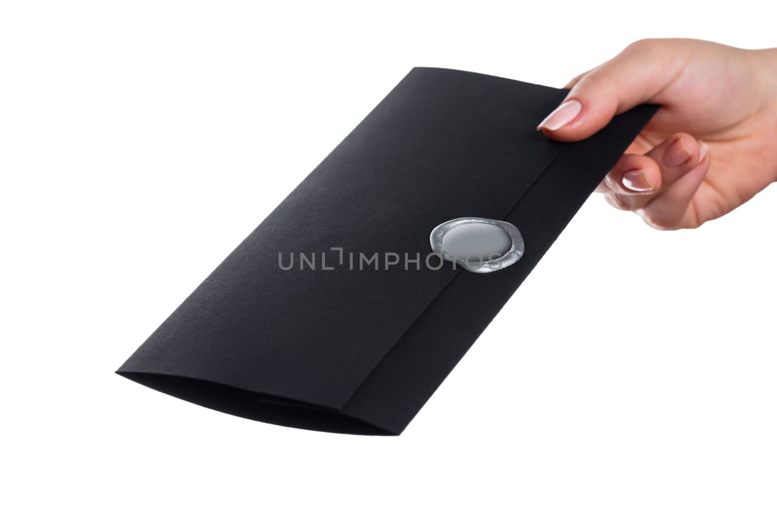 envelope in the hand on a white background isolated