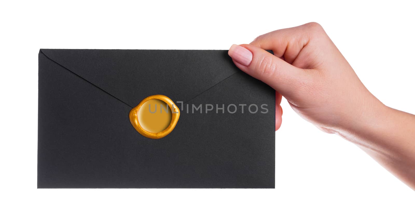 envelope in the hand on a white background isolated