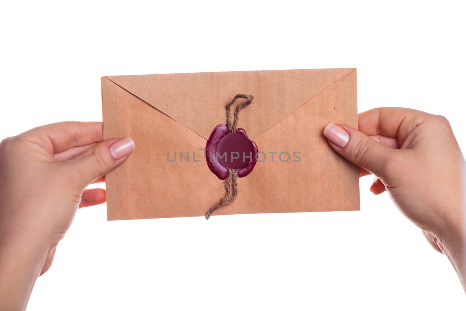 envelope in the hands on a white background isolated