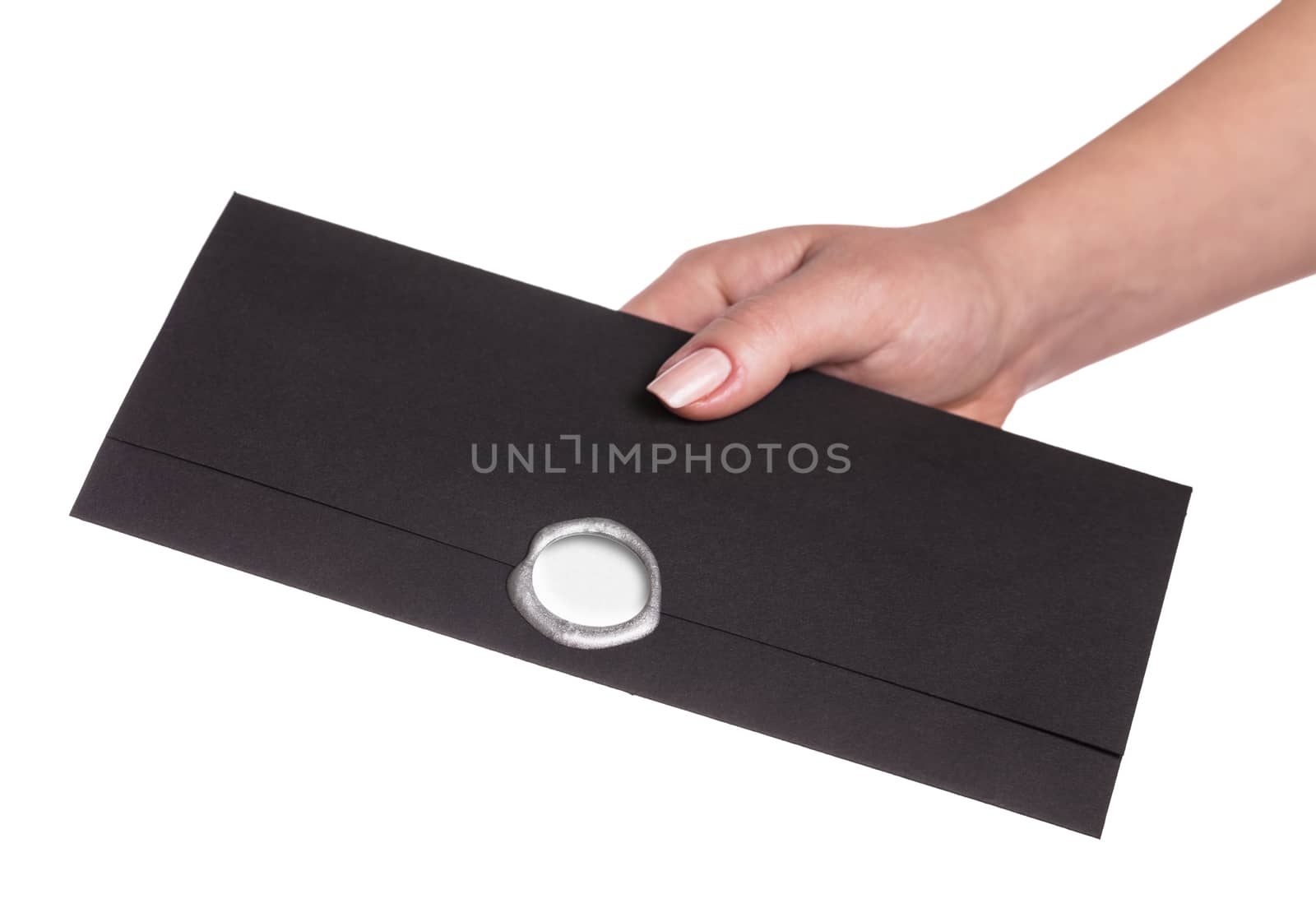 envelope in the hand on a white background isolated