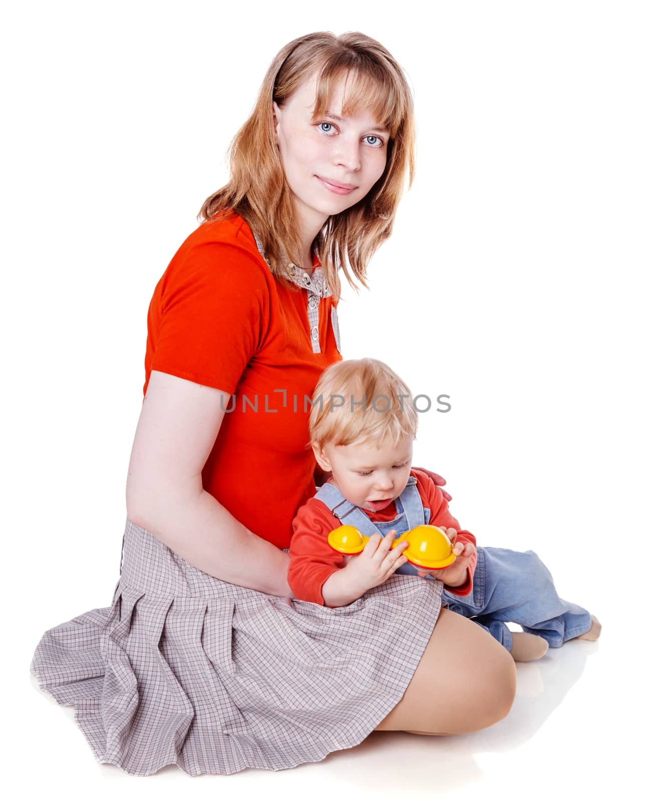 Mother with son sitting posing isolated on white