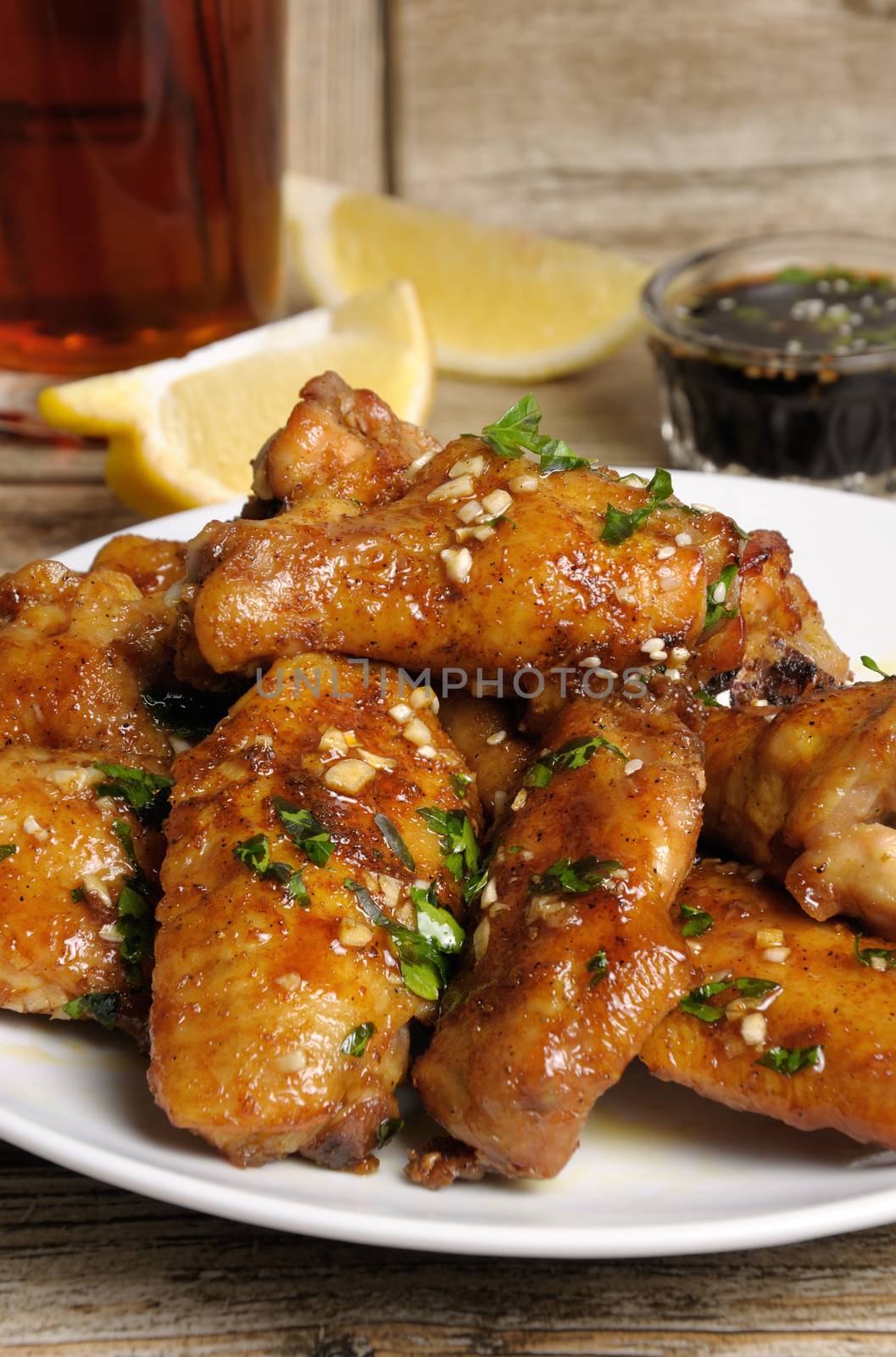 Fried chicken wings in ginger garlic marinade with herbs