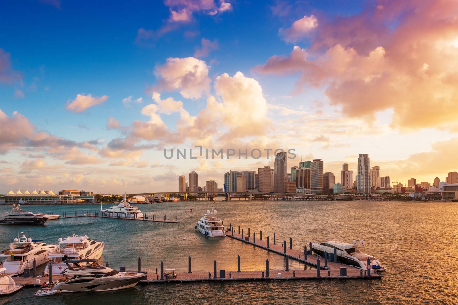 Downtown Miami, Florida, USA, and the port, seen from MacArthur Causeway at sunset.