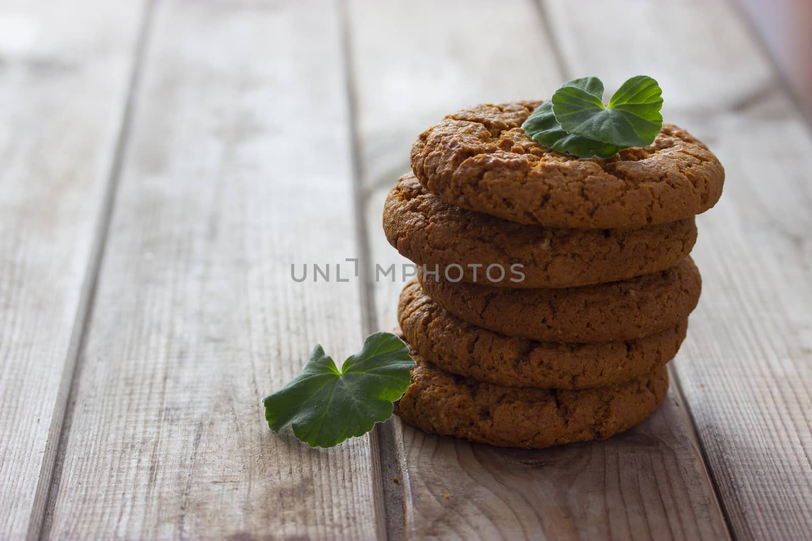 pile of cookie on wooden table background