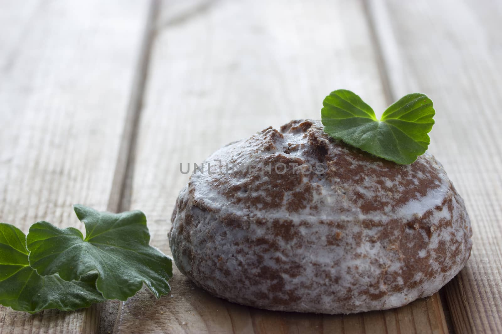 chocolate cake and mint on wooden table