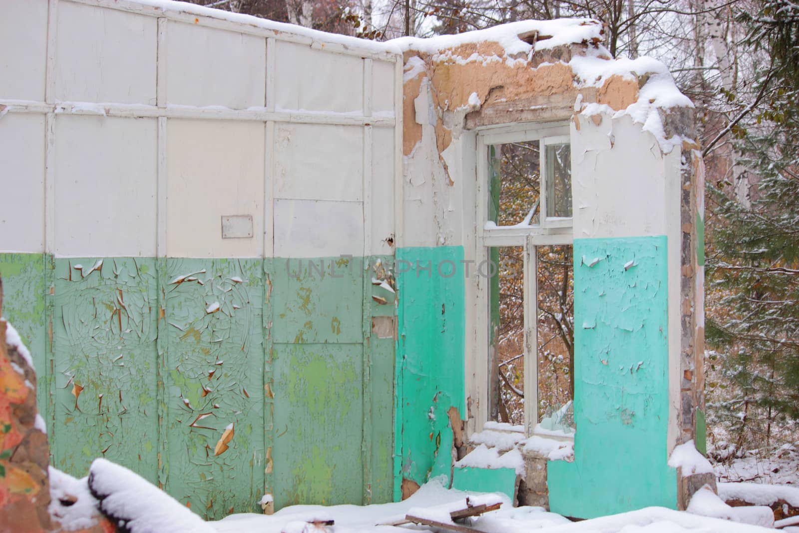 old ruined house covered with snow, apocalypse concept