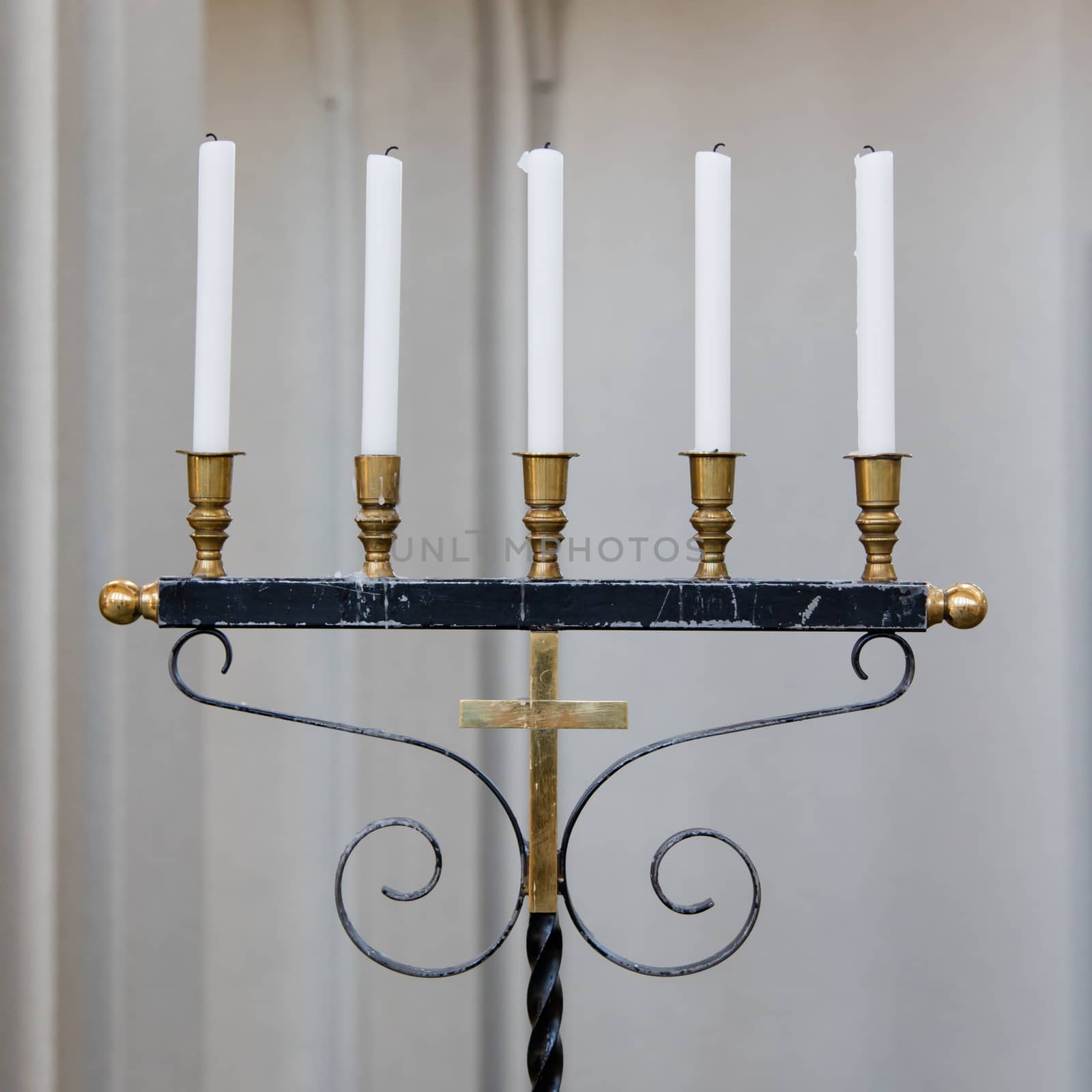 Old candleholder with 5 candles by michaklootwijk