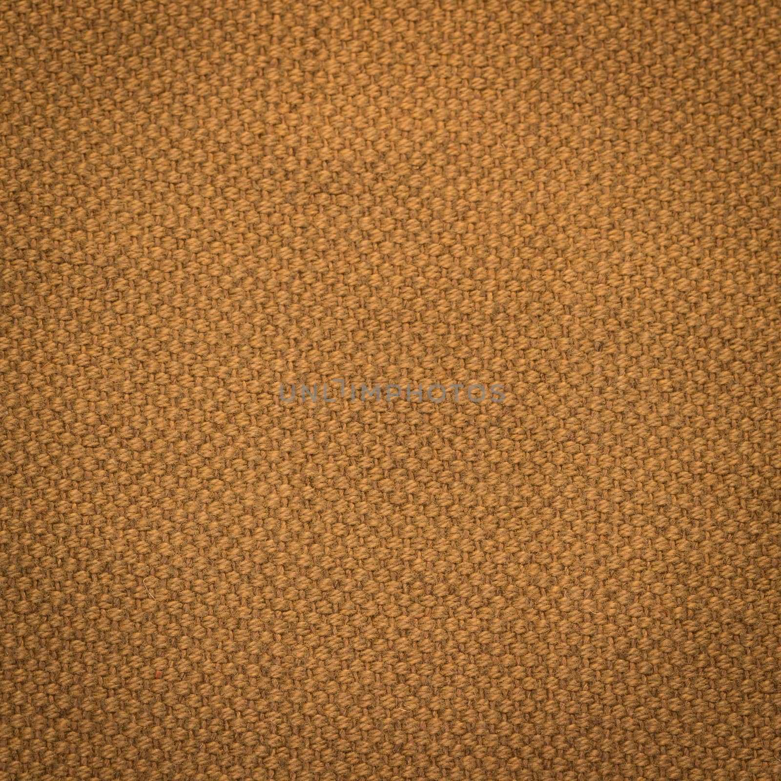 Rustic canvas fabric texture in orange color. Square shape