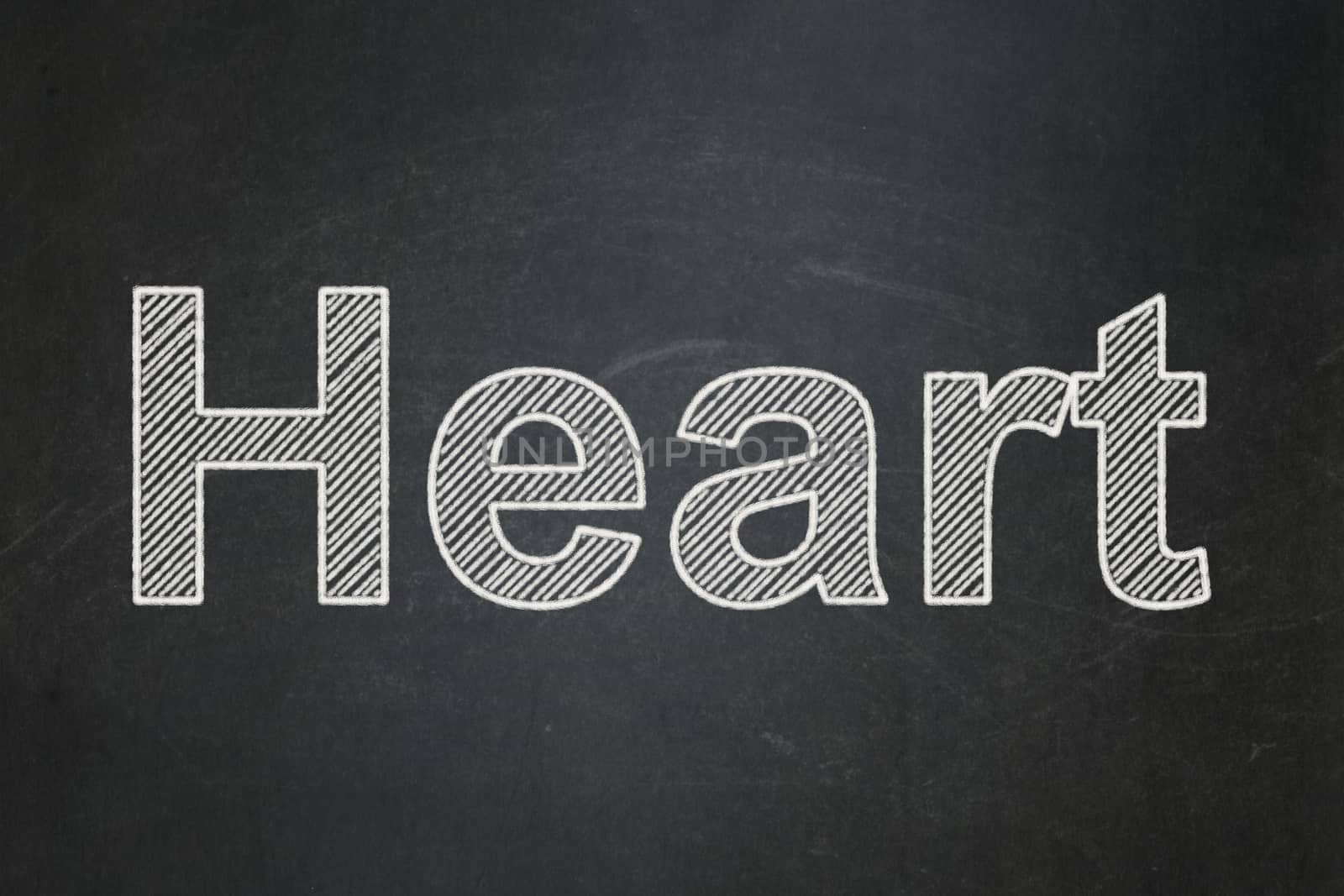 Medicine concept: text Heart on Black chalkboard background