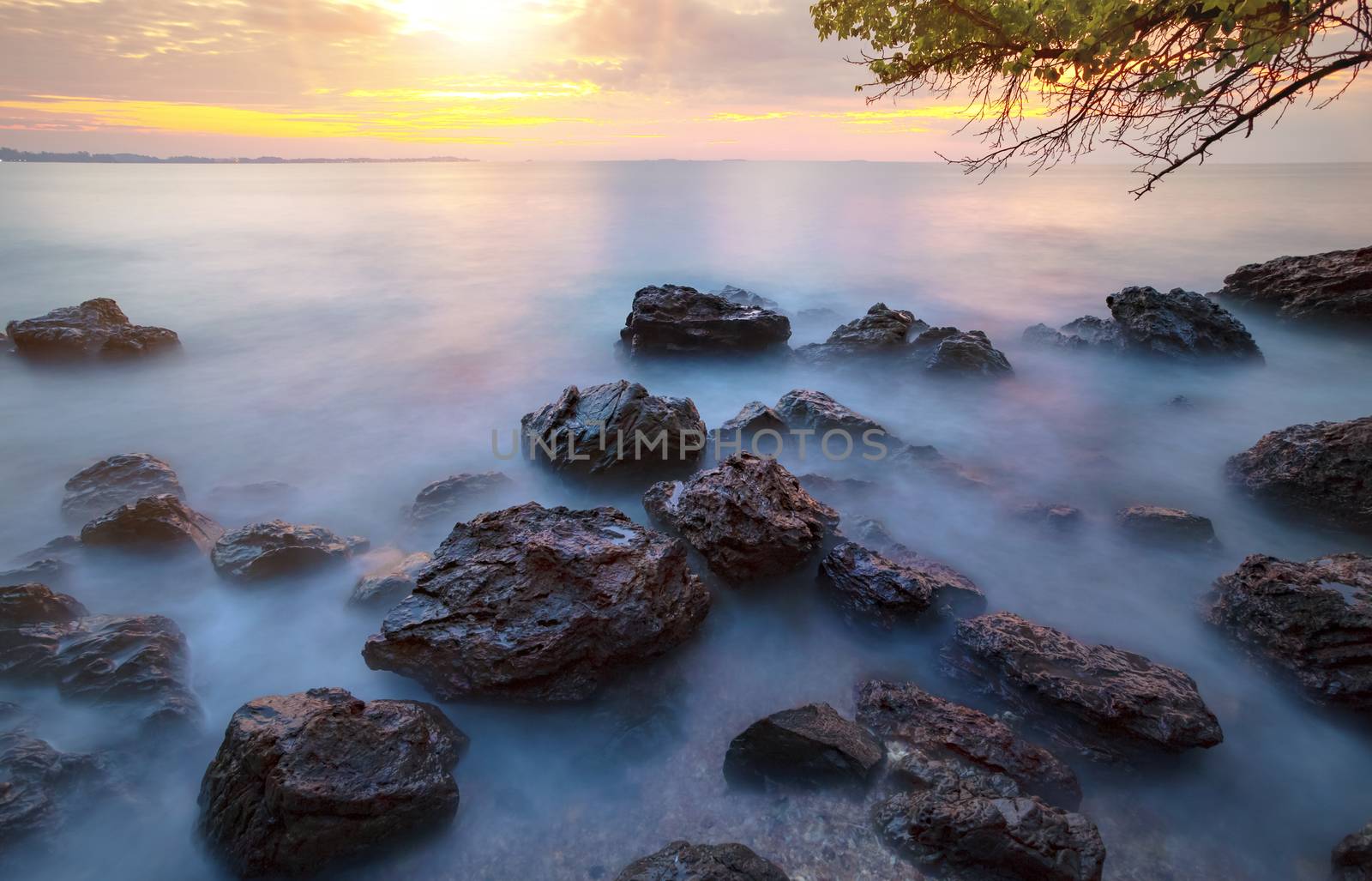 beautiful sun rising sky at sea beach with long exposure photography process