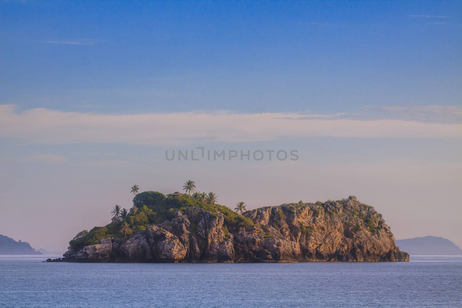 abandon island island and peaceful sea against blue sky