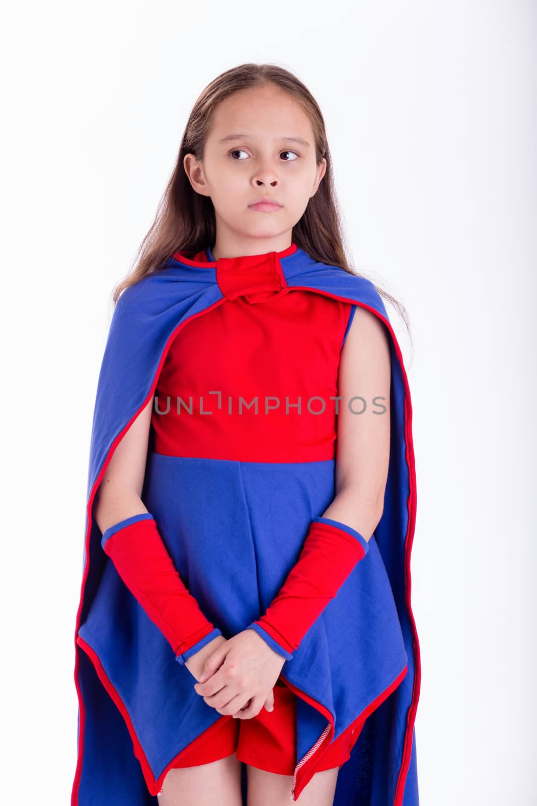Girl in blue and red superhero costume with worried look