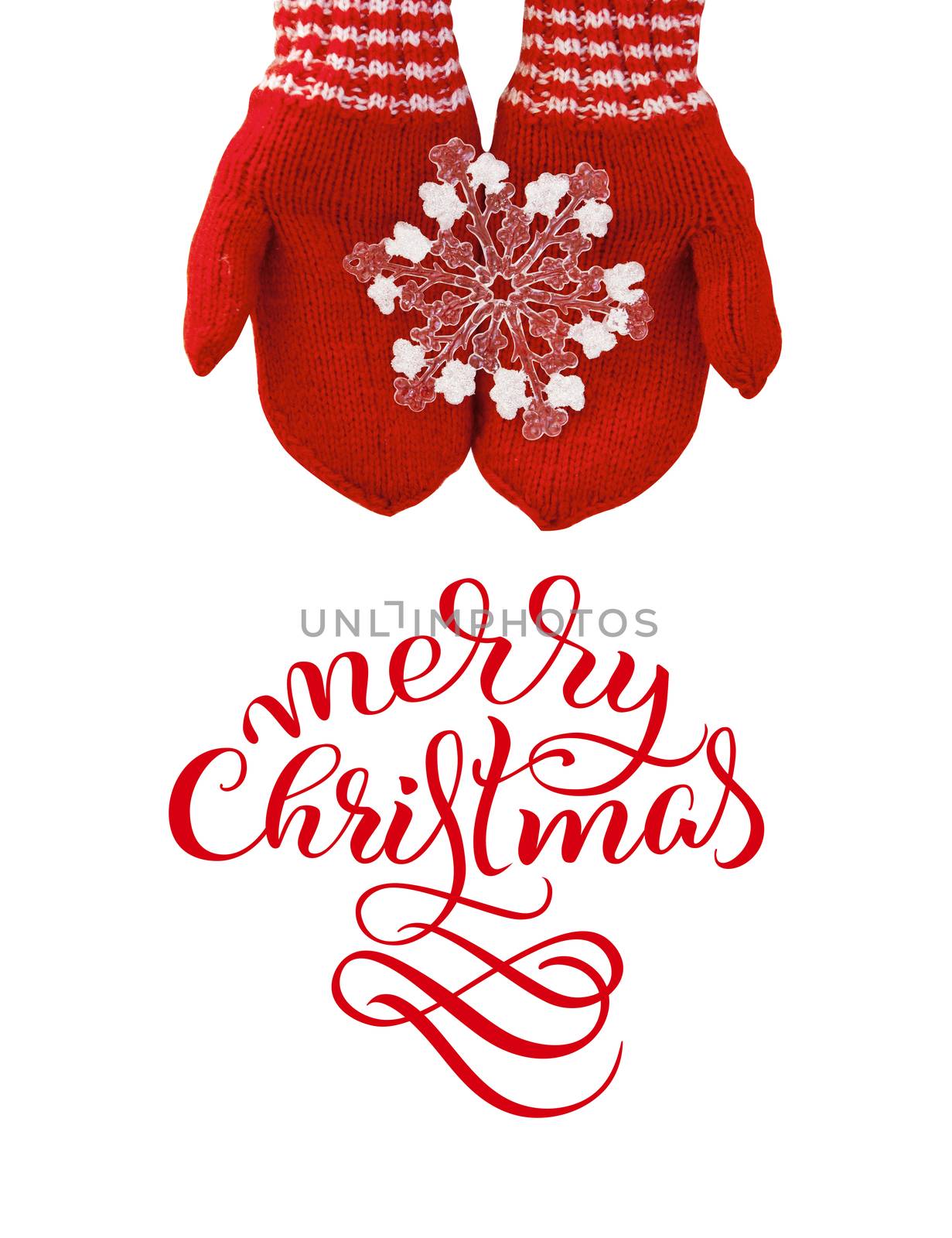 woman hands in red mittens hold a toy snowflake with text Merry Christmas. Lettering calligraphy.