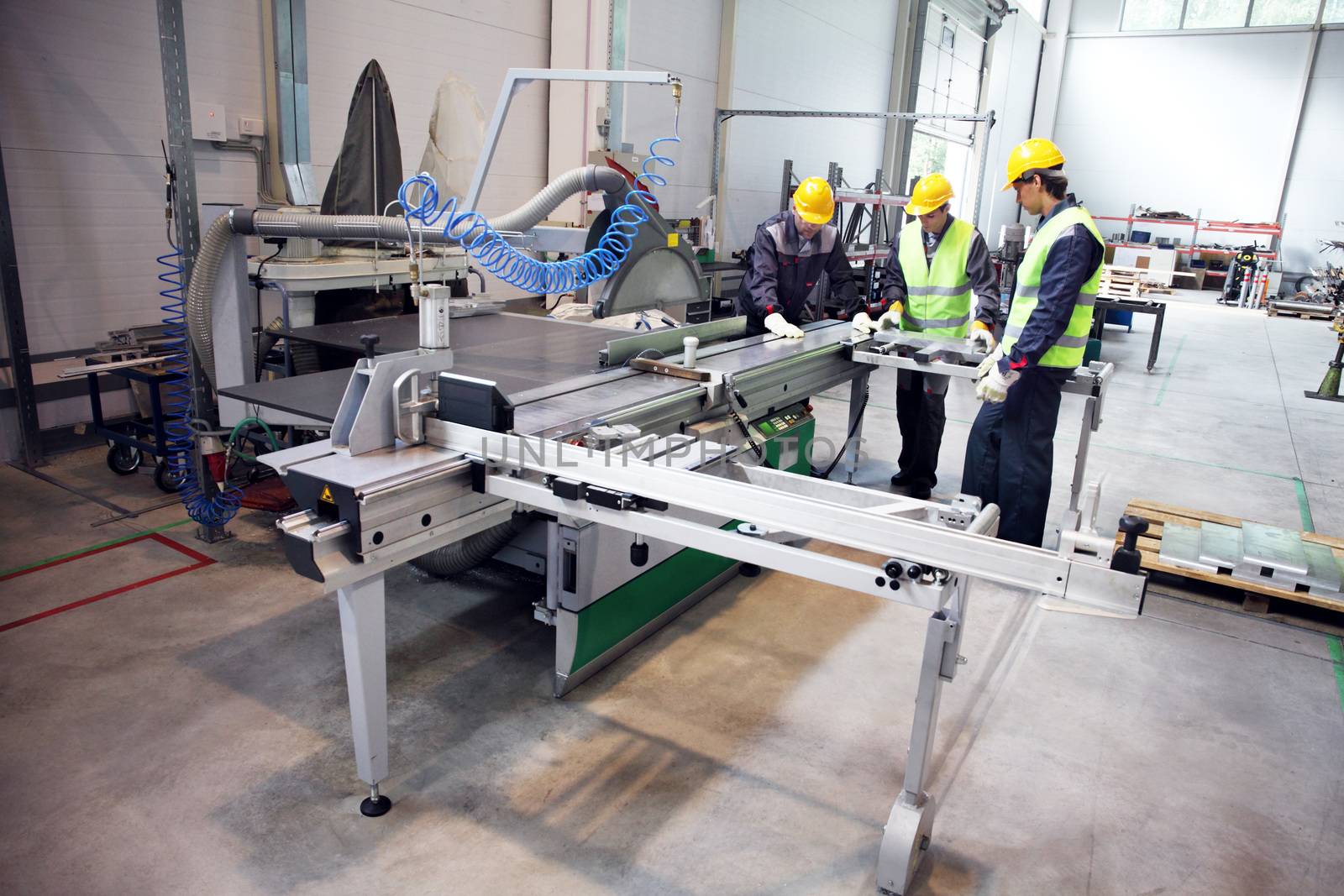 CNC machine shop with lathes, technicians and workers