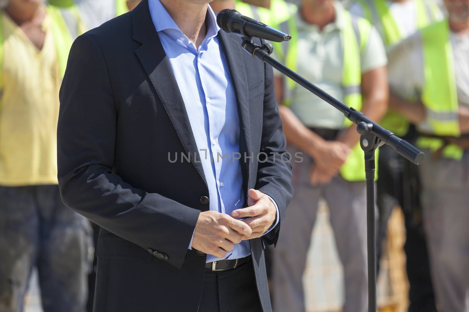  Politician or businessman is giving a speech by wellphoto