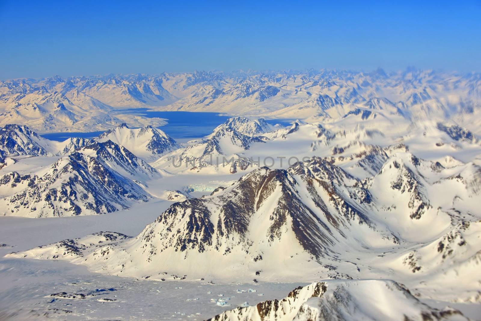 View at Greenland frozen mountains from above