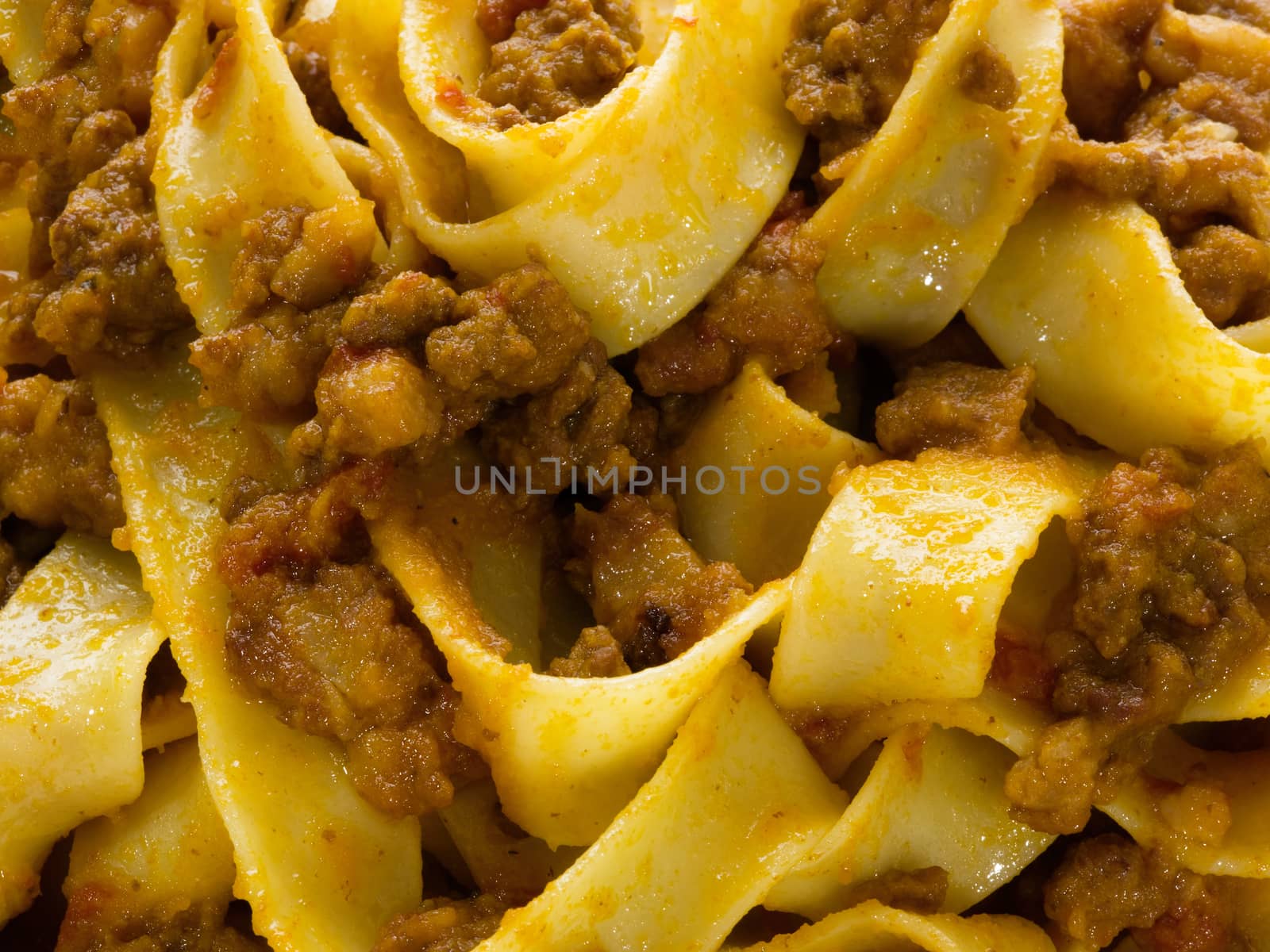 close up of rustic traditional italian pappardelle bolognese