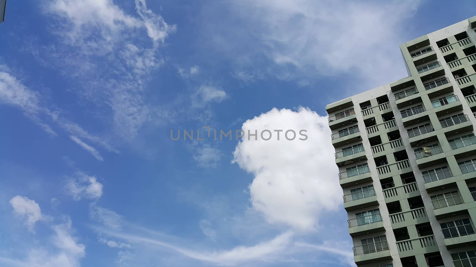 Apartment building and blue sky.