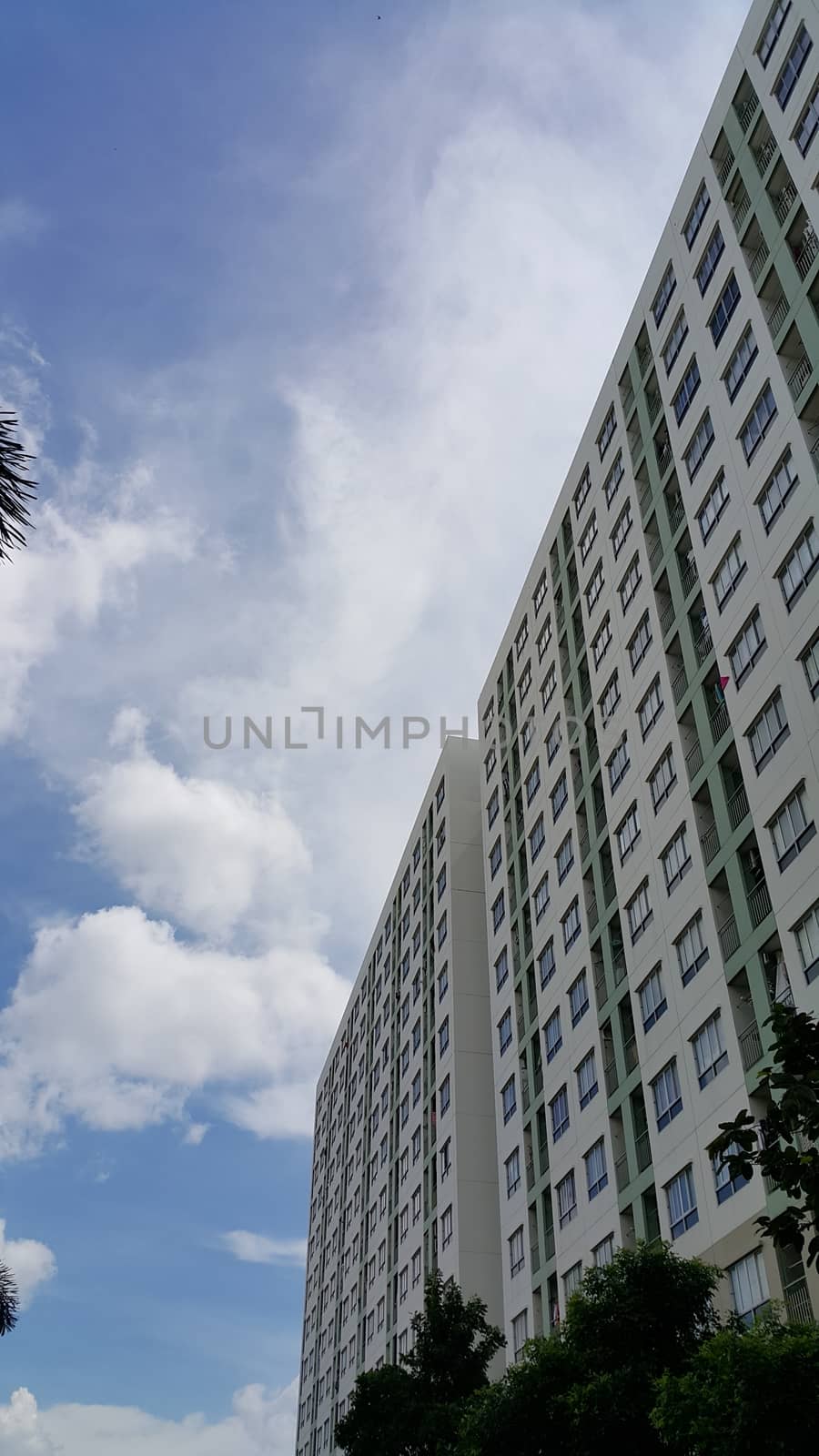 Condominium and the blue sky.