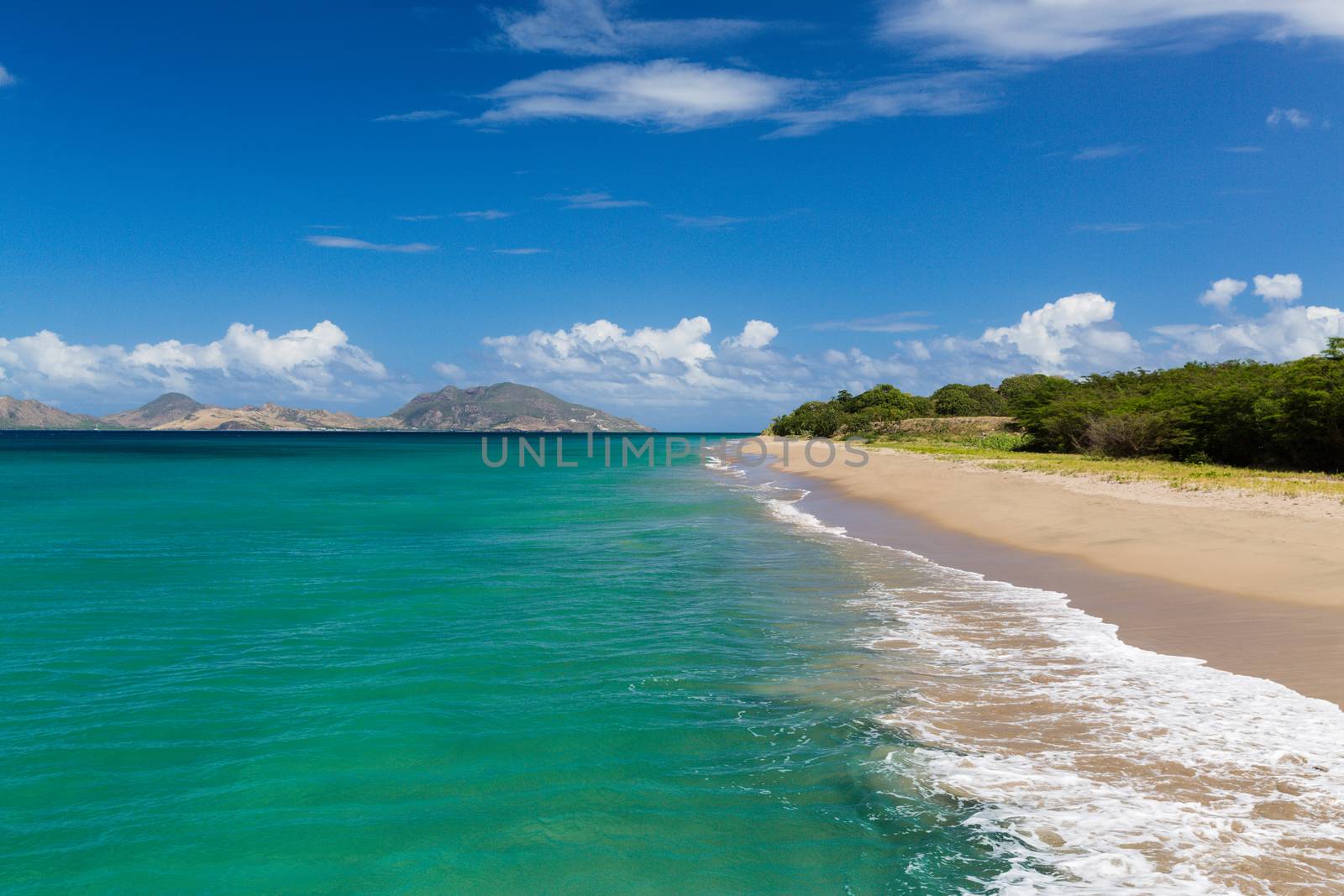 Beach in St Nevis looking back to St Kitts by chrisukphoto