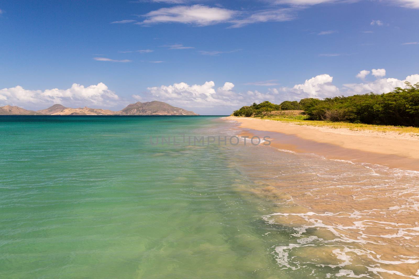 Beach on St Nevis looking at St Kitts by chrisukphoto