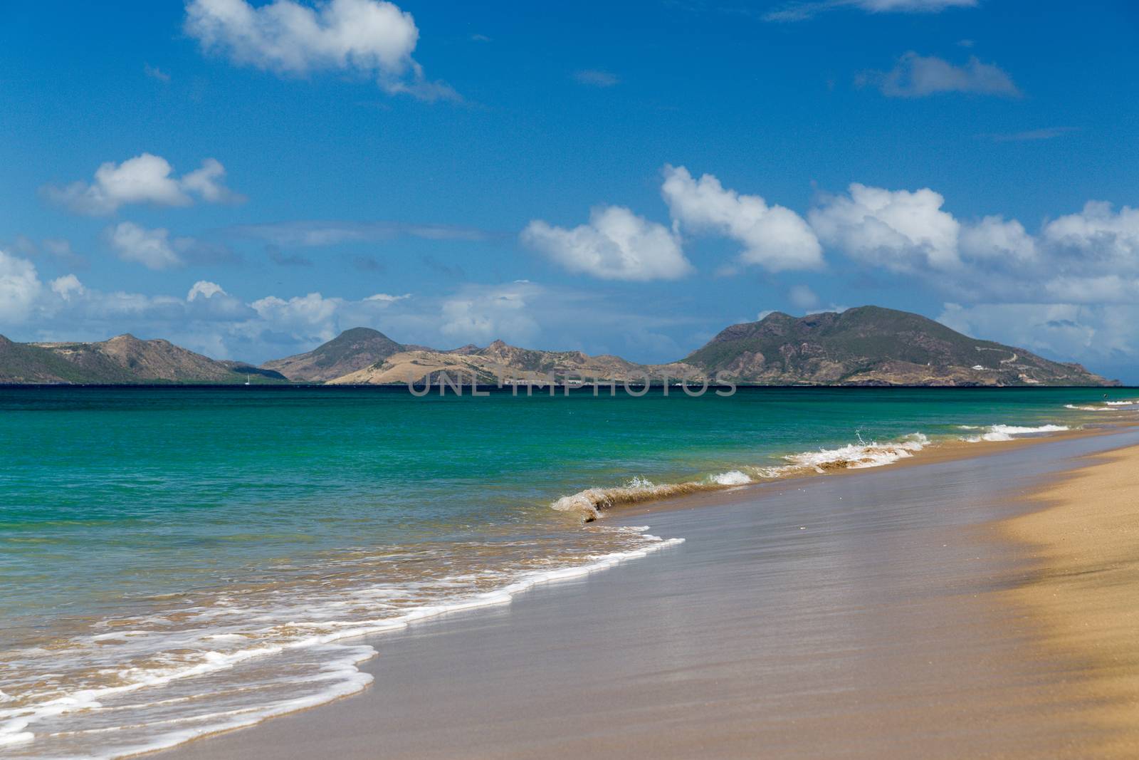 Beach in St Nevis looking towards St Kitts by chrisukphoto