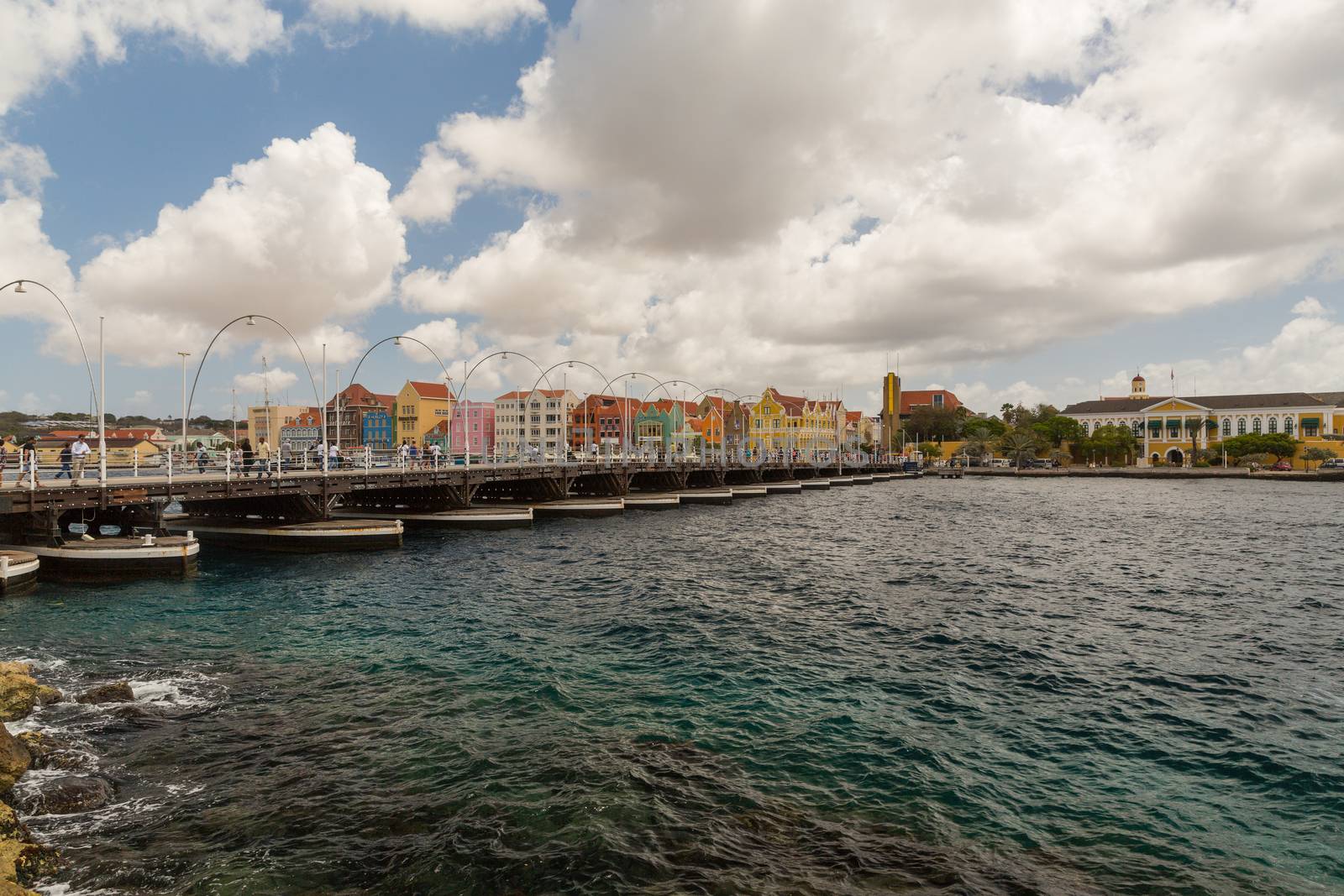 Queen Emma Bridge in Willemstad Curacao by chrisukphoto