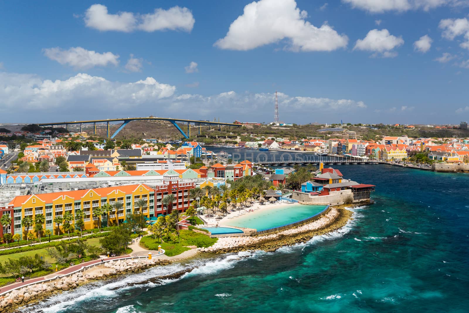 Willemstad in Curacao and the Queen Emma Bridge by chrisukphoto