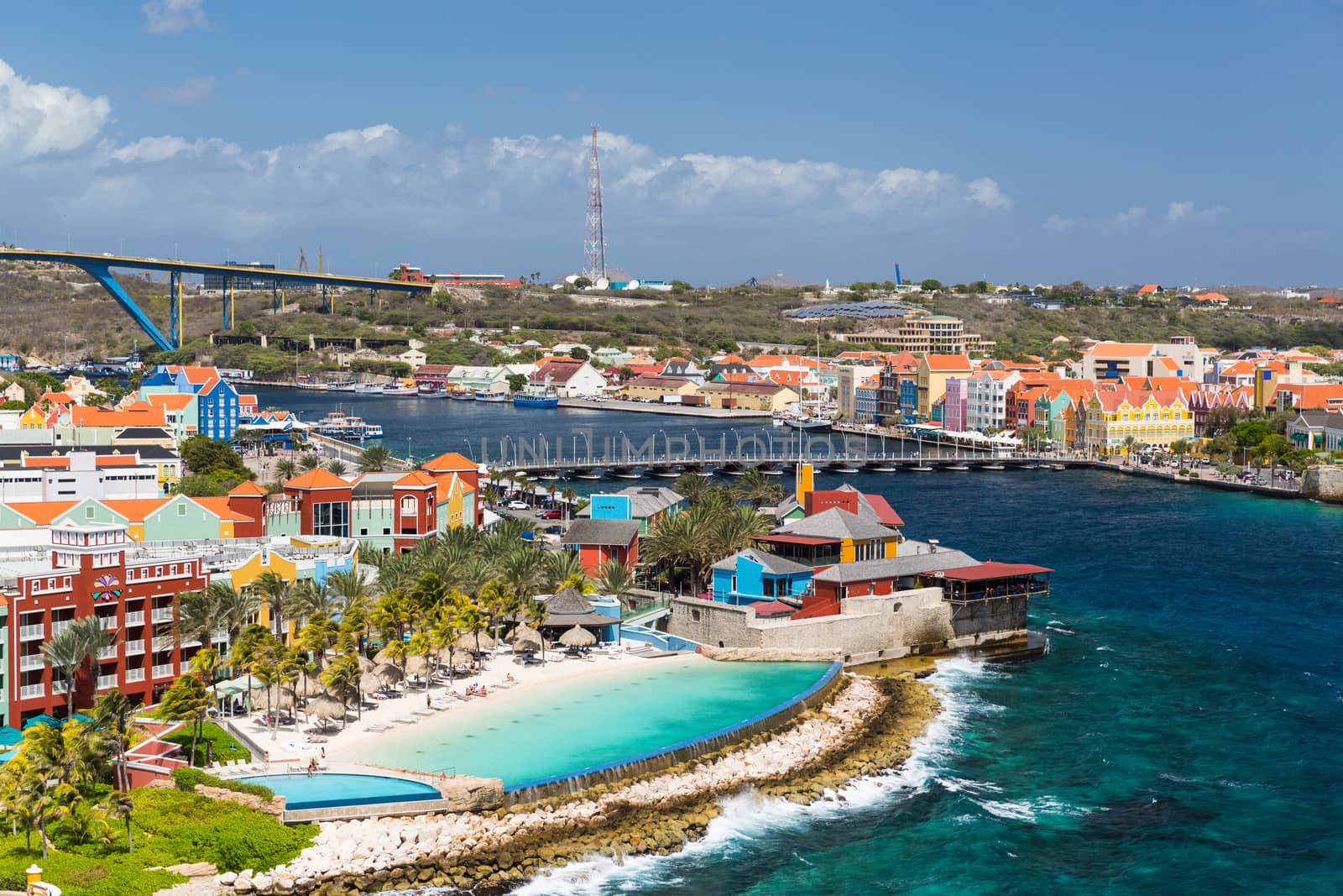 Willemstad in Curacao and the Queen Emma Bridge by chrisukphoto