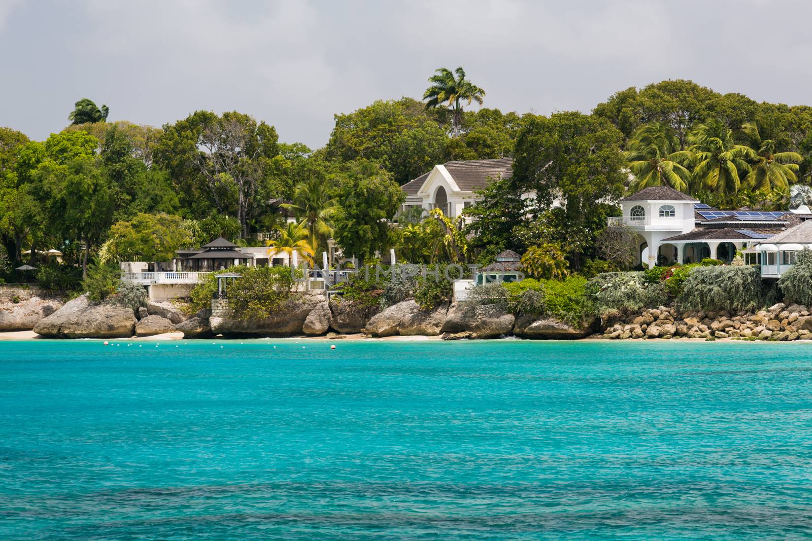 Residences off the coast of Barbados by chrisukphoto