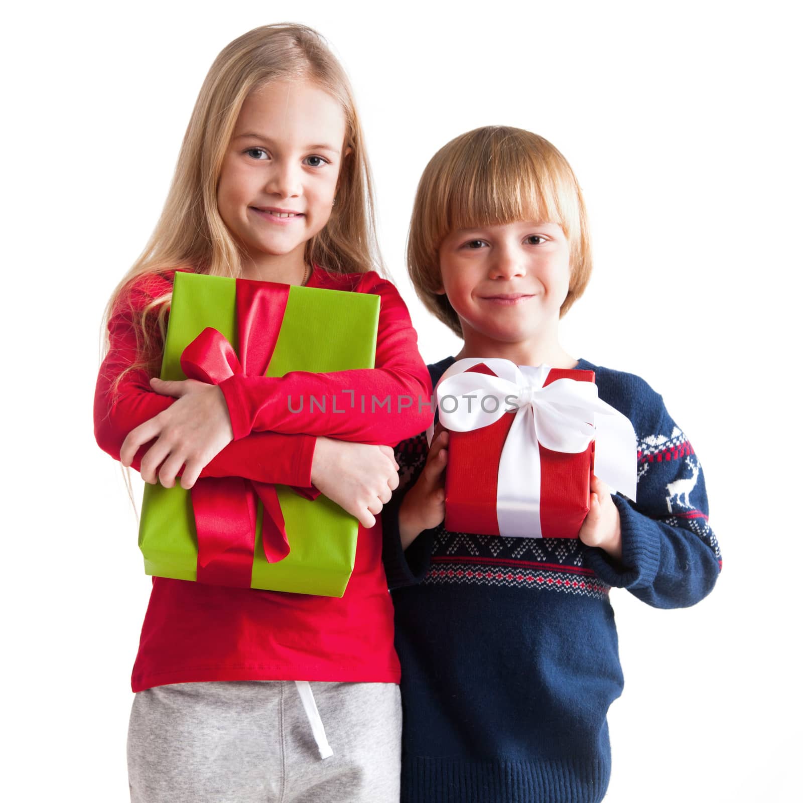 Smiling boy and girl with gifts isolated on white
