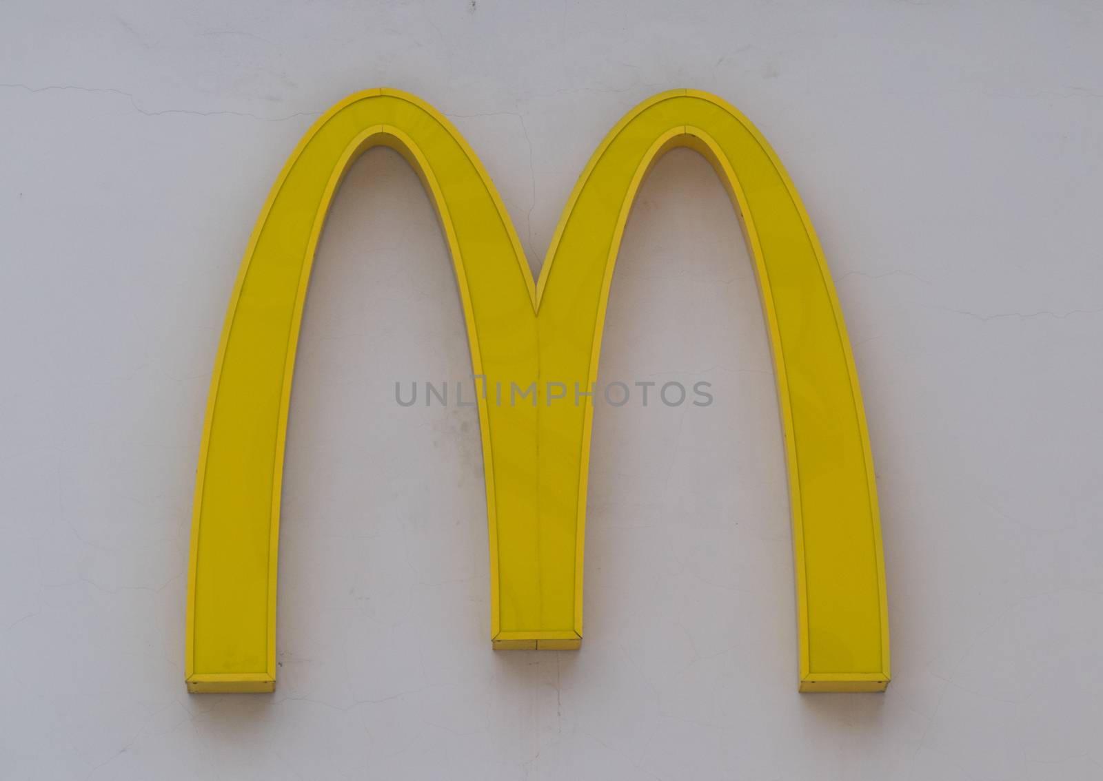 Symbol M McDonald on a light background Russia