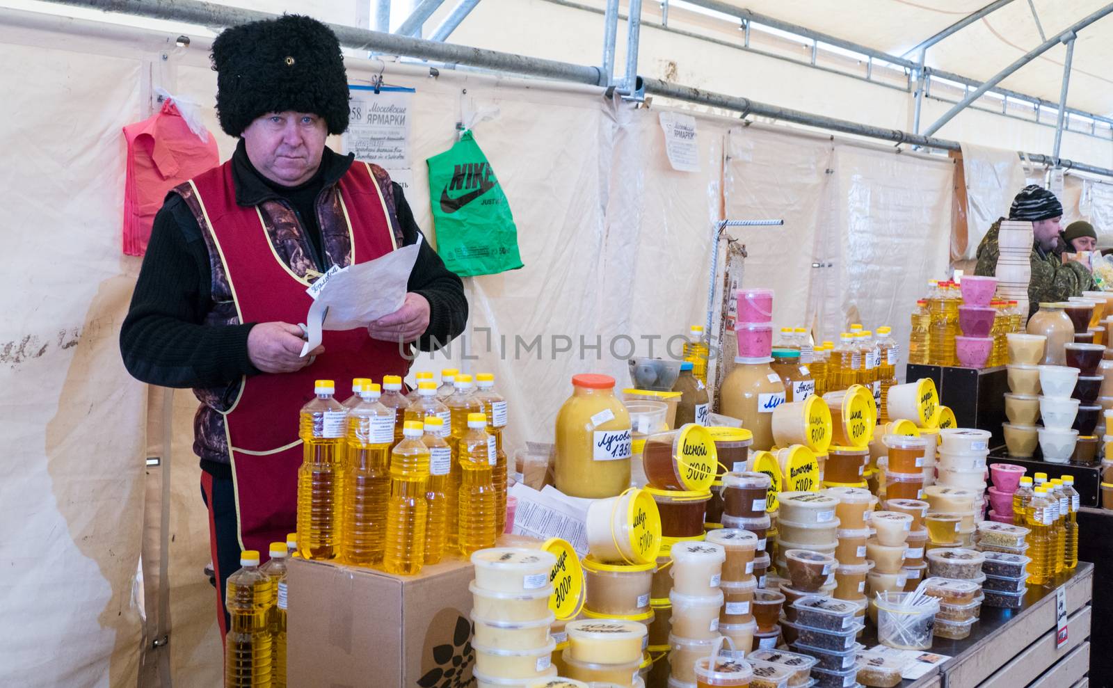 Moscow, 4 December 2016 honey trader in a Cossack hat