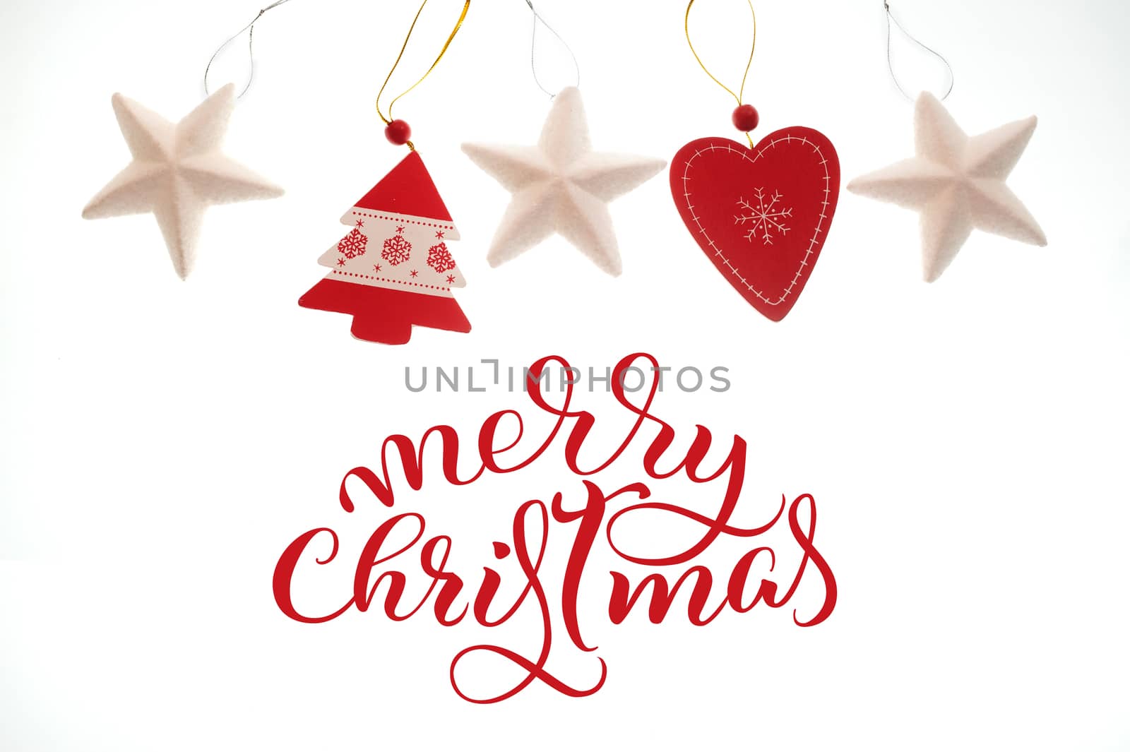 Festive Christmas Toys isolated on white background and text Merry Christmas. Lettering calligraphy.