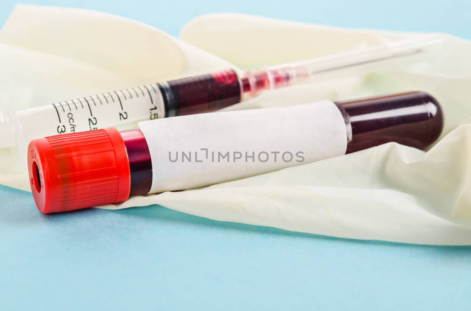 Sample blood for screening test and syringe. by Gamjai