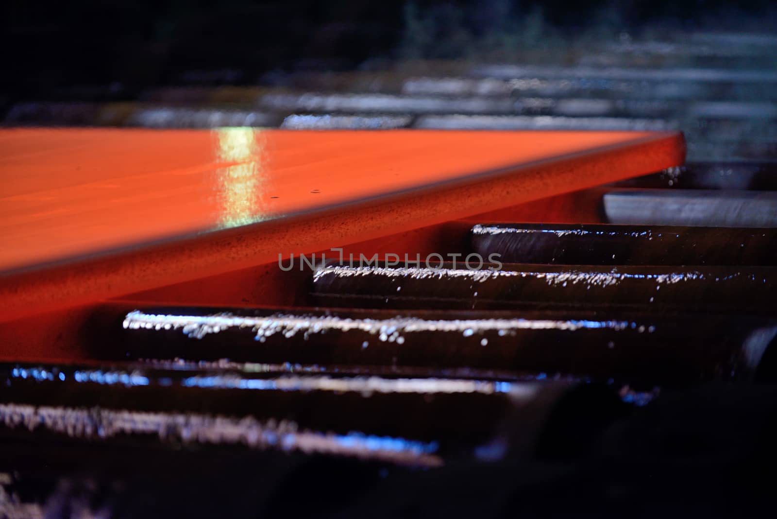 Hot steel plate on conveyor