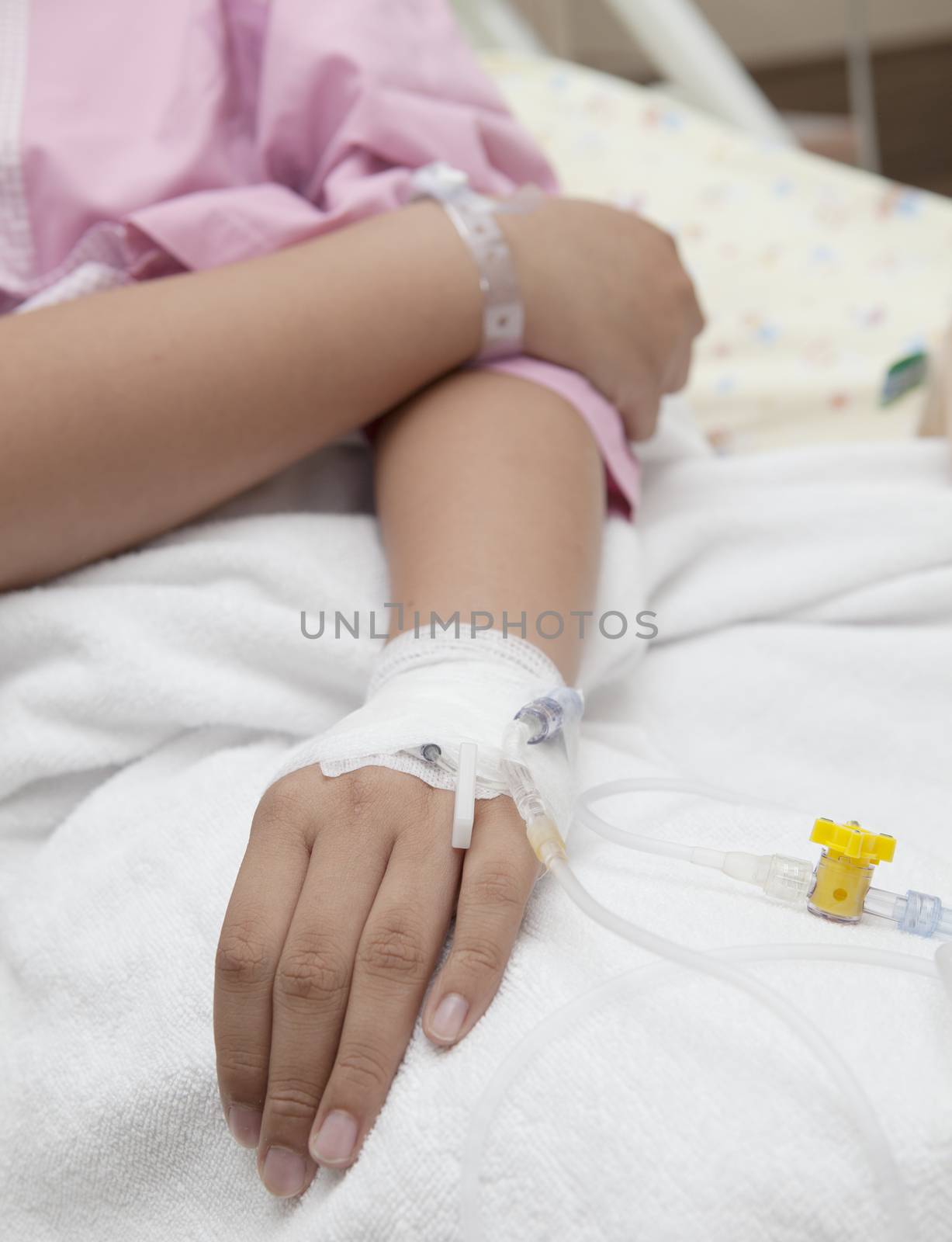 hand of patient lying on hospital bed use for health and medical treatment 