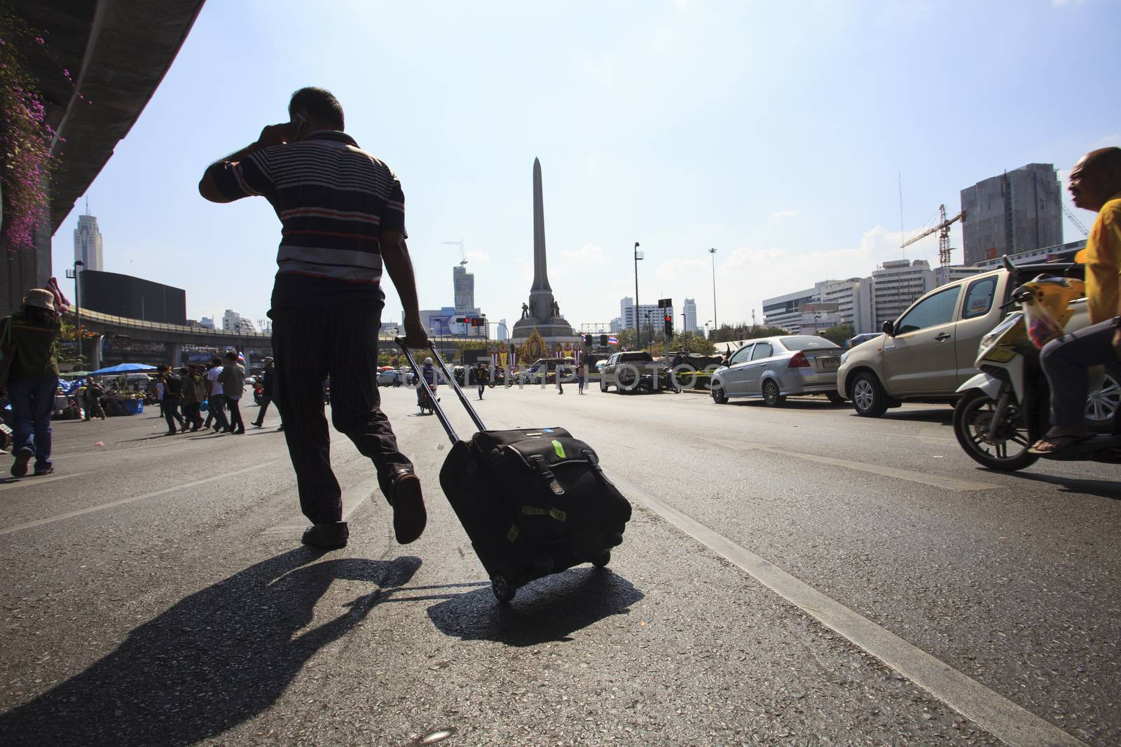 Bangkok Thailand-Jan13- thai government protester mobbing by shu by khunaspix