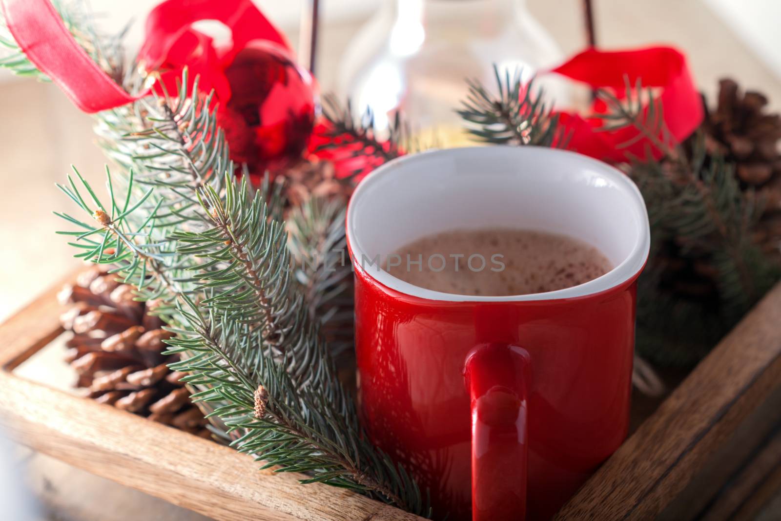Christmas cocoa in mug on the wooden tray