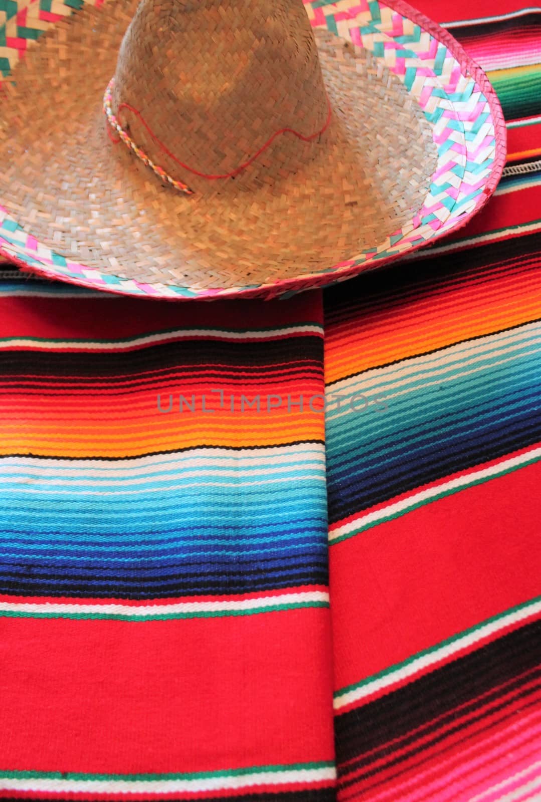 Mexico traditional cinco de mayo rug poncho fiesta background with stripes copy space