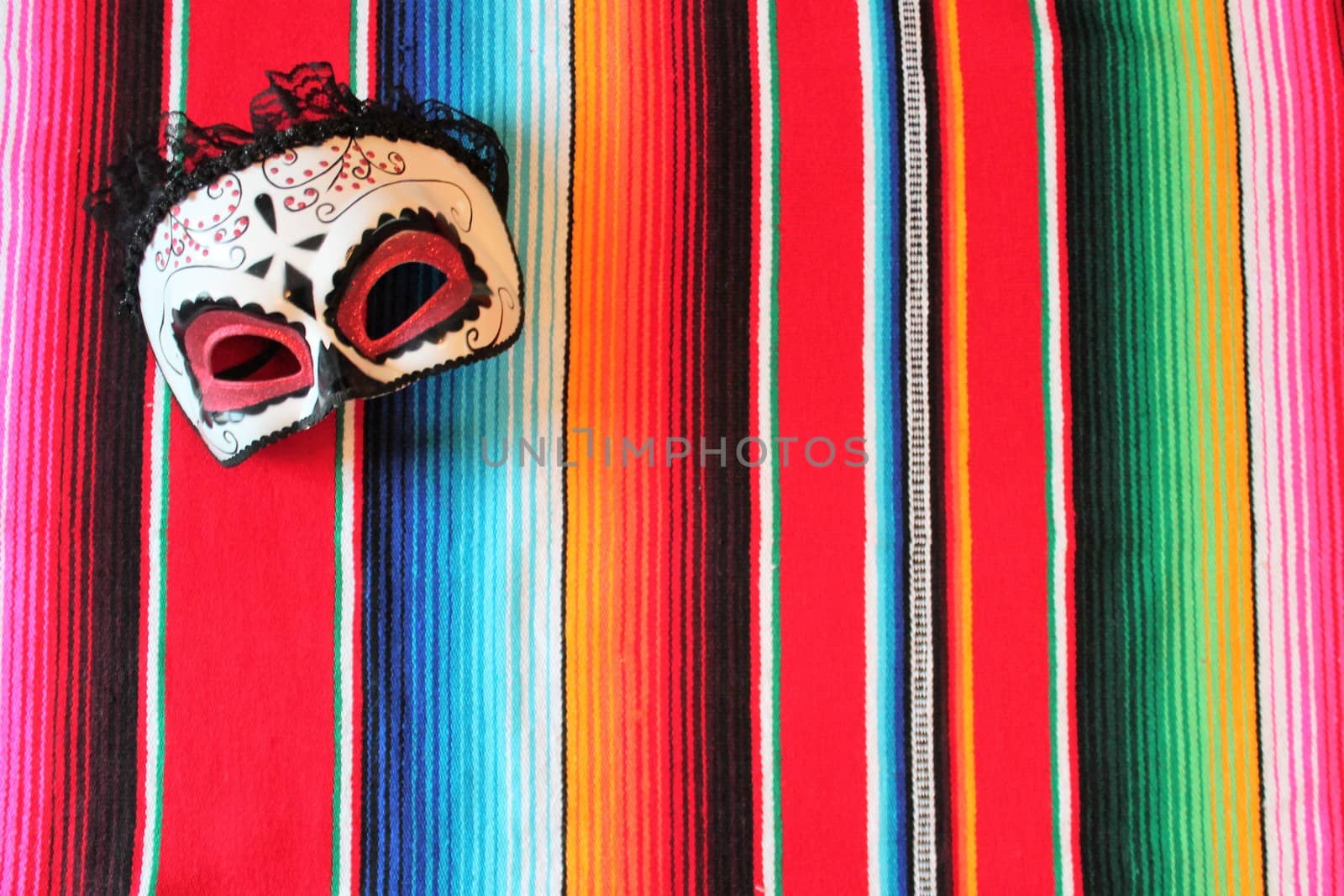 Mexico traditional cinco de mayo rug poncho fiesta background with stripes copy space