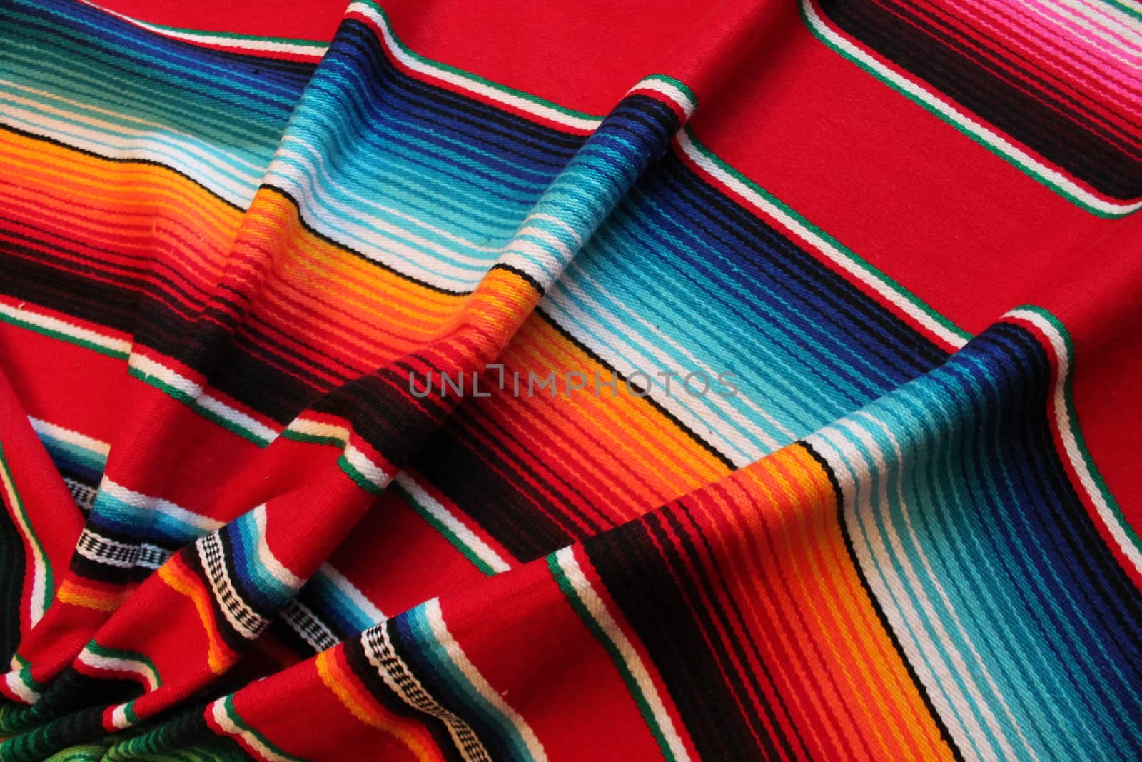 Mexico traditional cinco de mayo rug poncho fiesta background with stripes copy space