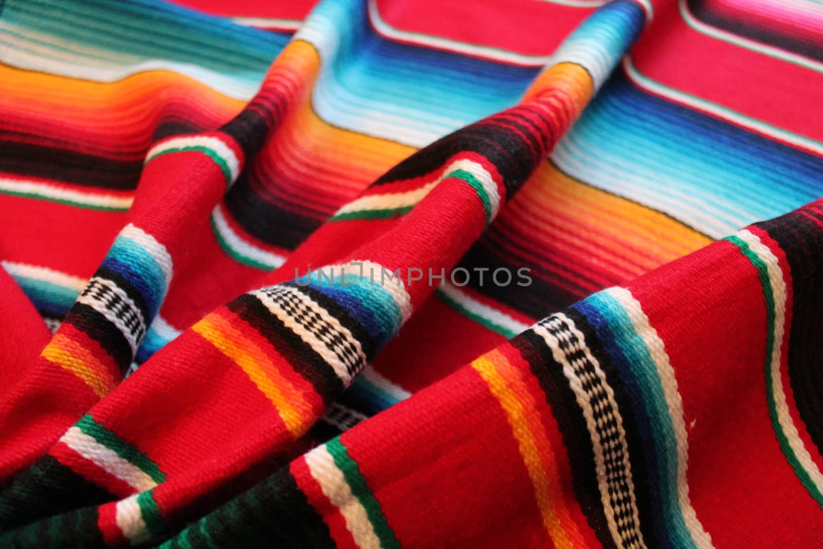 Mexico traditional cinco de mayo rug poncho fiesta background with stripes copy space