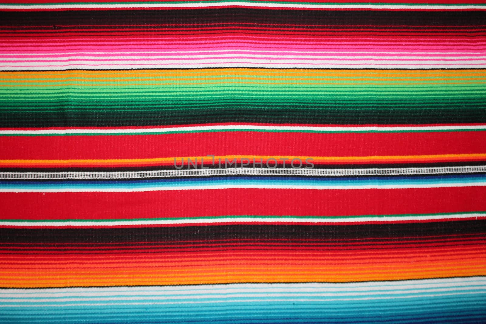 Mexico traditional cinco de mayo rug poncho fiesta background with stripes copy space