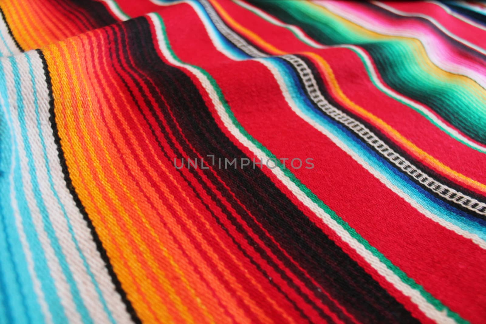 Mexico traditional cinco de mayo rug poncho fiesta background with stripes copy space