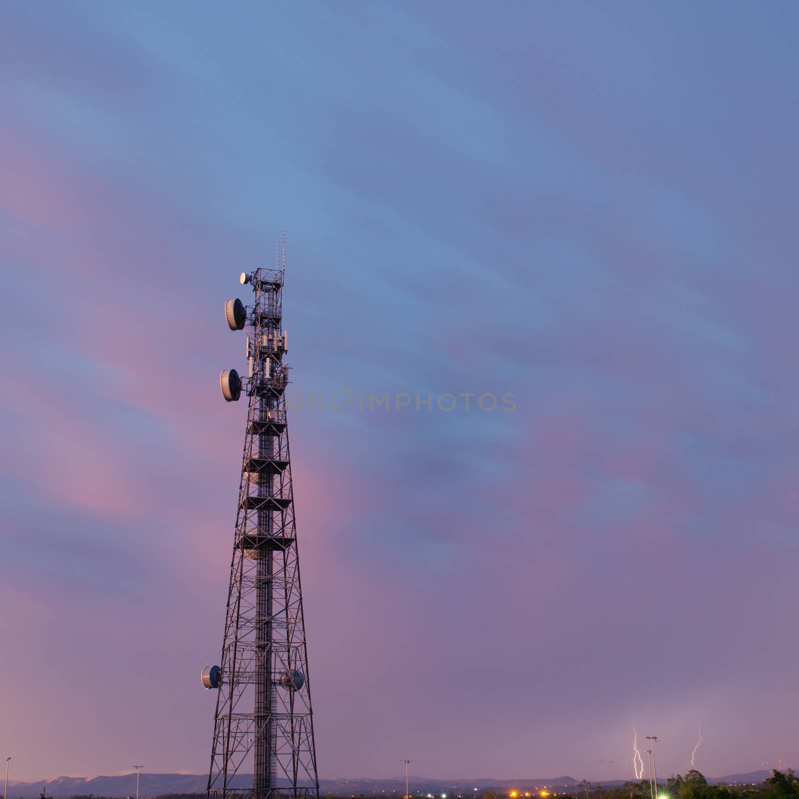 Radio tower in Queensland during a lightning storm. by artistrobd