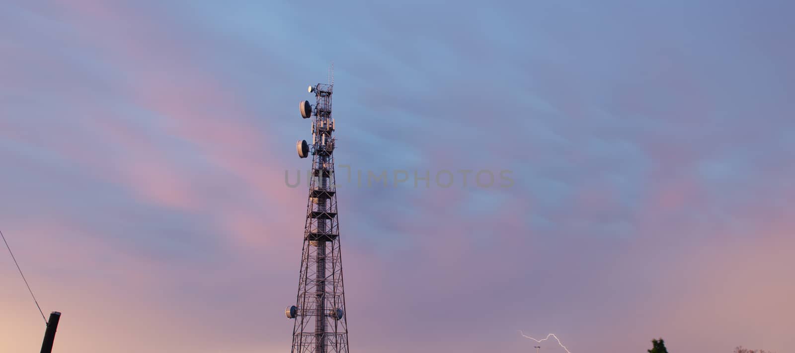 Radio tower during a storm with lightning in Redbank Plains, Brisbane, Queensland.