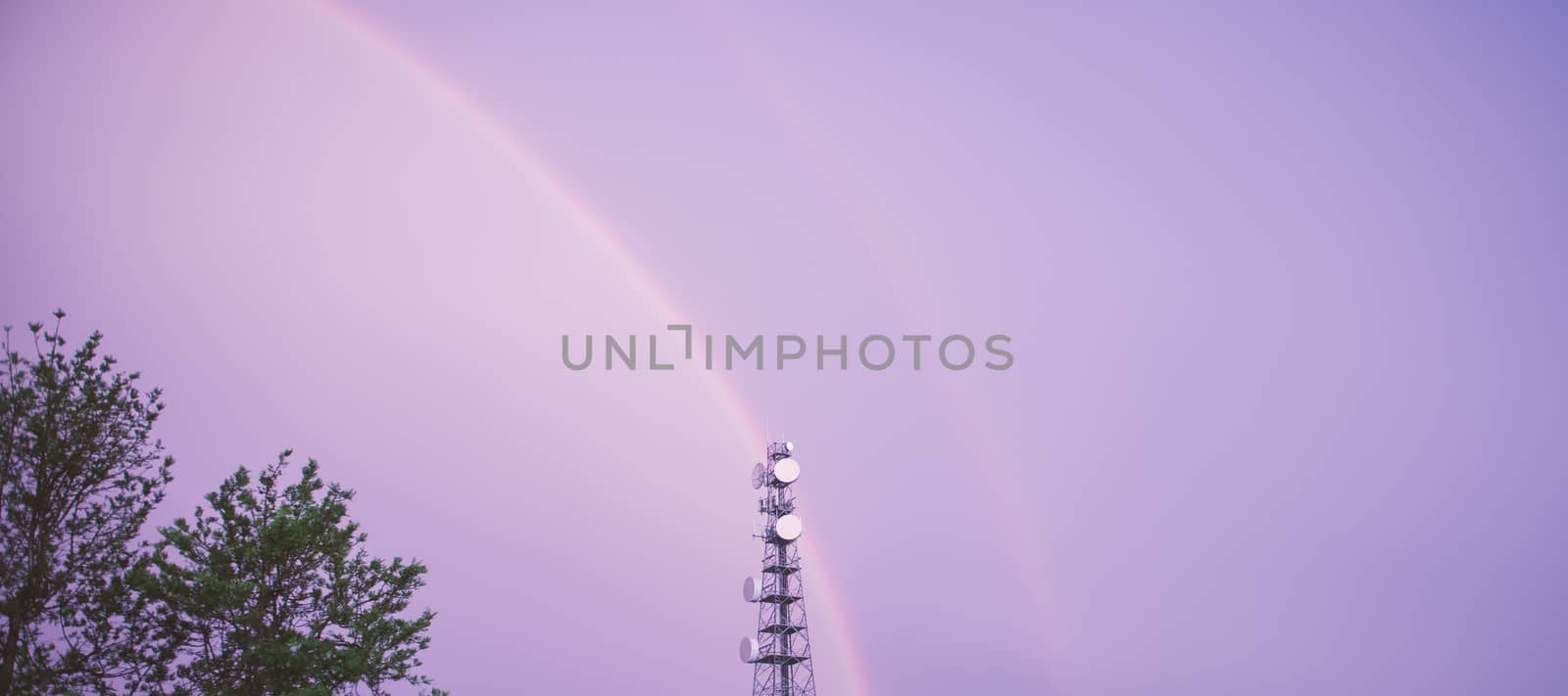 Radio tower in the after a storm with a rainbow in Redbank Plains, Brisbane, Queensland.