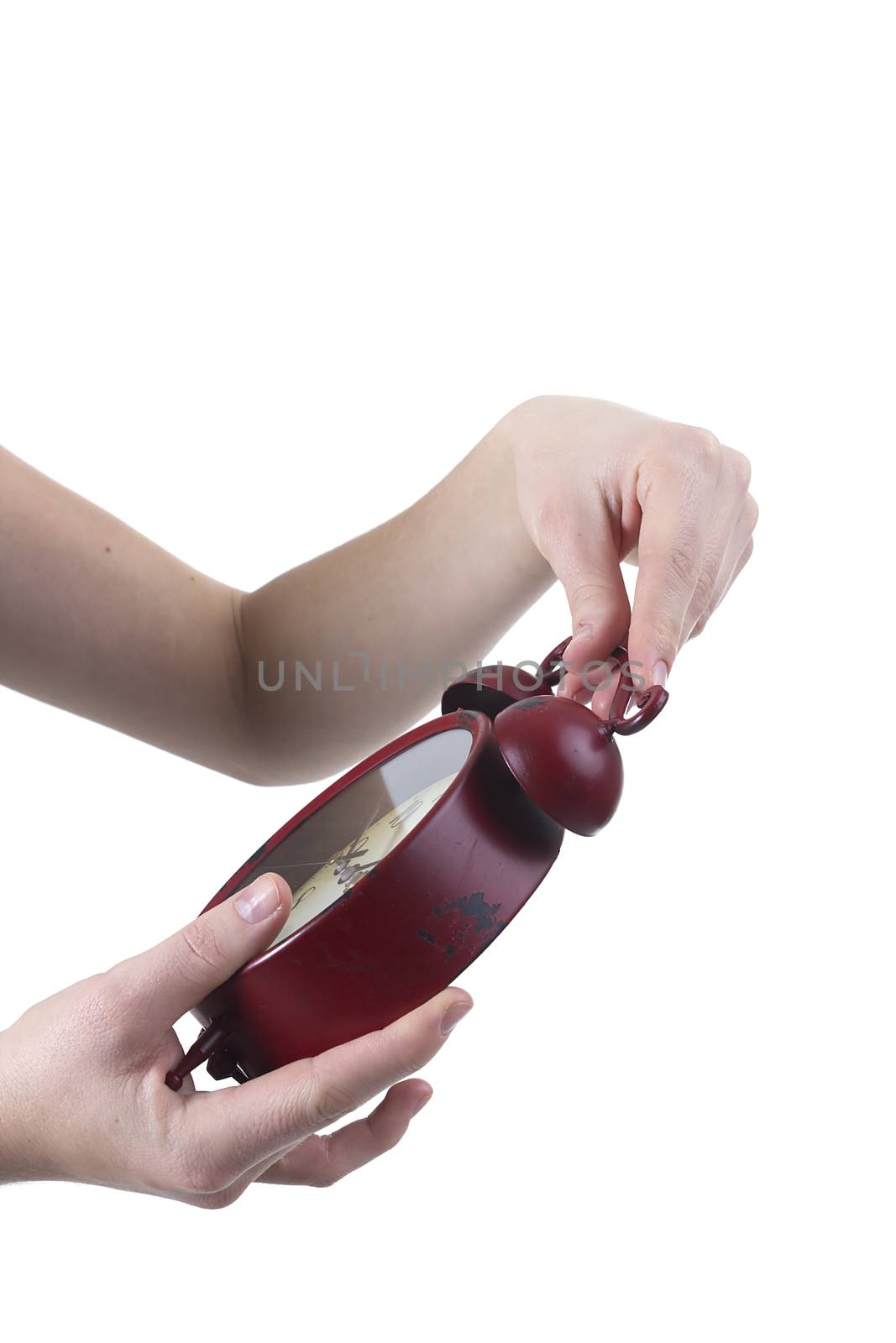 Female hand with alarm clock by VIPDesignUSA