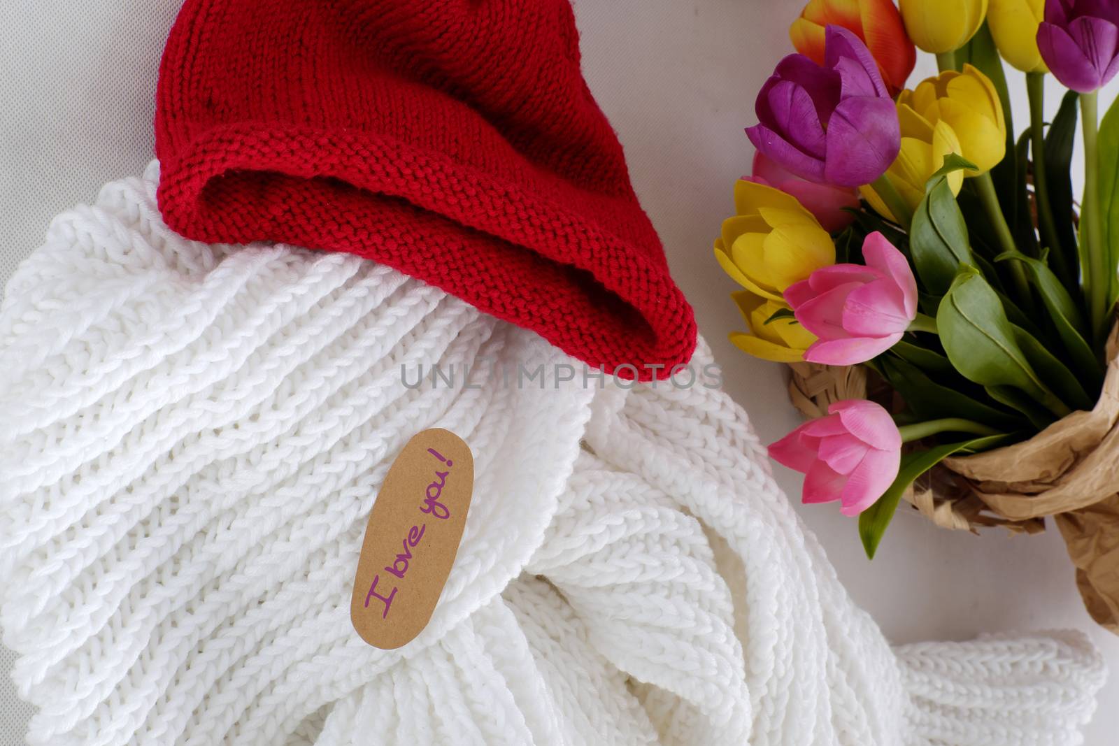 Diy handmade gift for mother with love, knit white scarf and red hat from yarn make warm in cold day of winter season